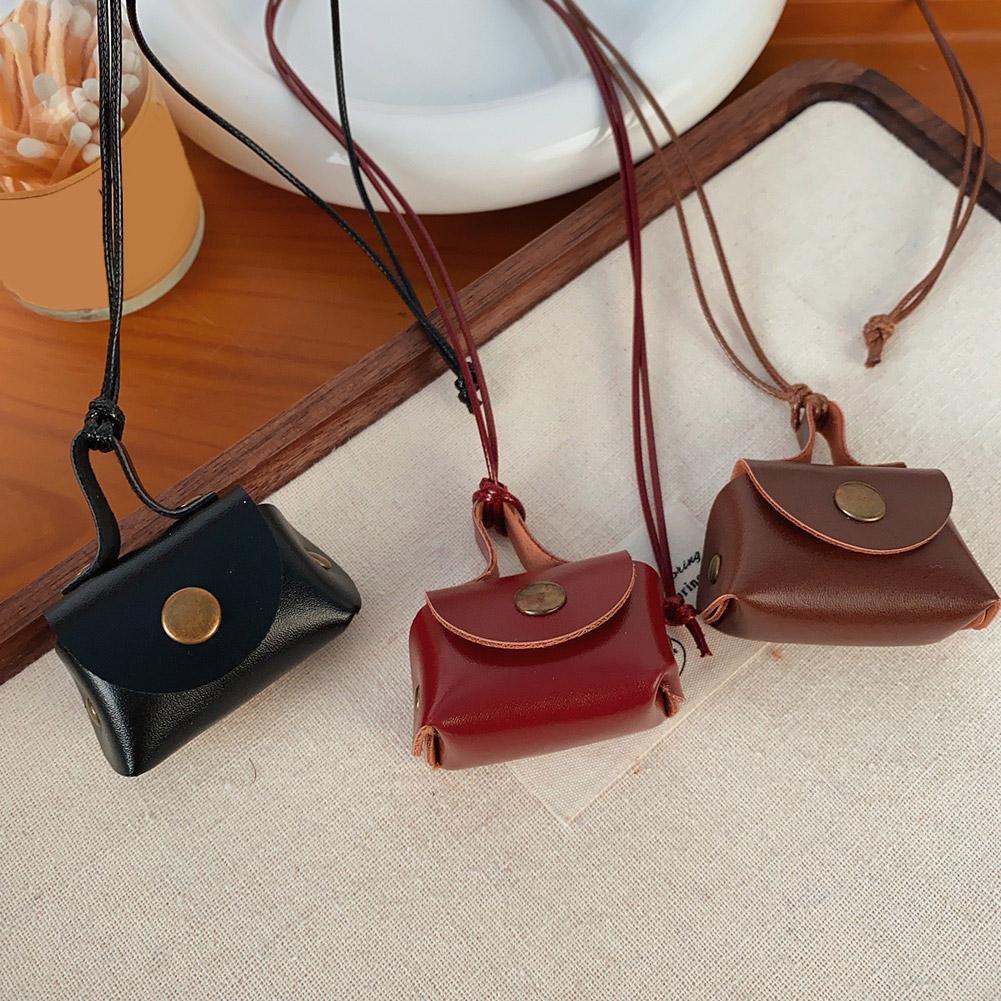 MINI Retro Money Pouch Pendant - огляд і ціна Body Jewelry Websites